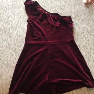 Dark red velvet one shoulder romper with ruffle